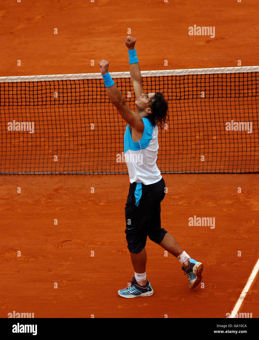 Tennis - 2007 French Open - Day Thirteen - Roland Garros. Rafael Nadal celebrates match point against Novak Djokovic during the mens semi final of the French Open Stock Photo