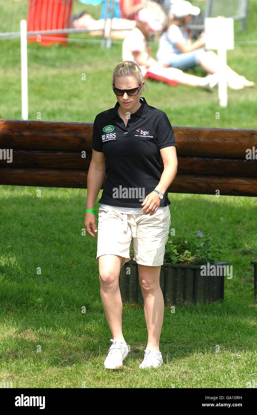 Enjoying the hot weather and wearing shorts, Zara Phillips looks at the  Cross Country course at the Bramham Horse Trials before she was due to  compete in the event Stock Photo -