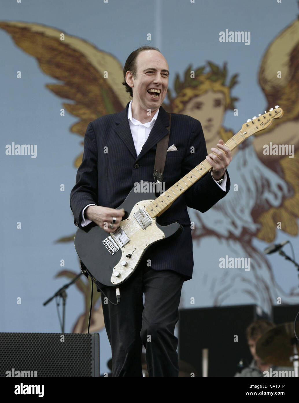 Mick Jones and his band Carbon Silicone perform at the Isle of Wight Festival in Seaclose Park