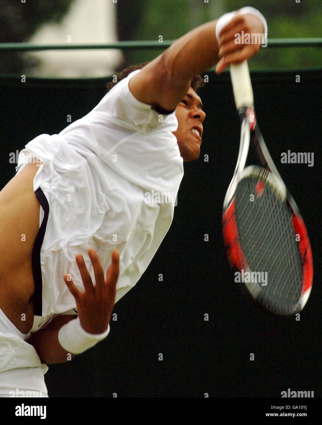 France's Jo-Wilfried Tsonga in action against Australia's Chris Guccione during the Surbiton Trophy tournament at Surbiton Racket and Fitness Club, Surrey. Stock Photo