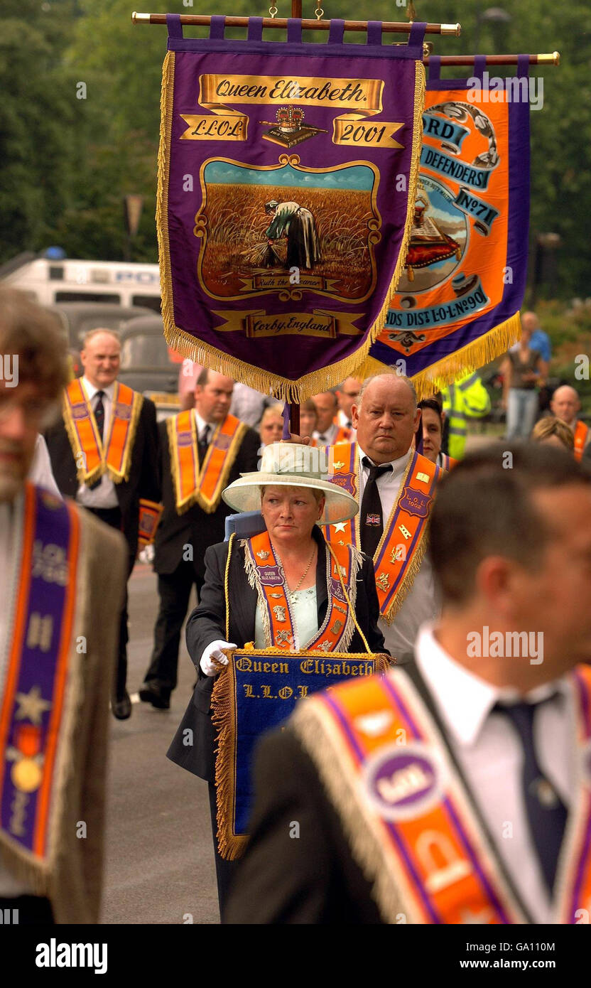 Members of the orange order march through central london hires stock