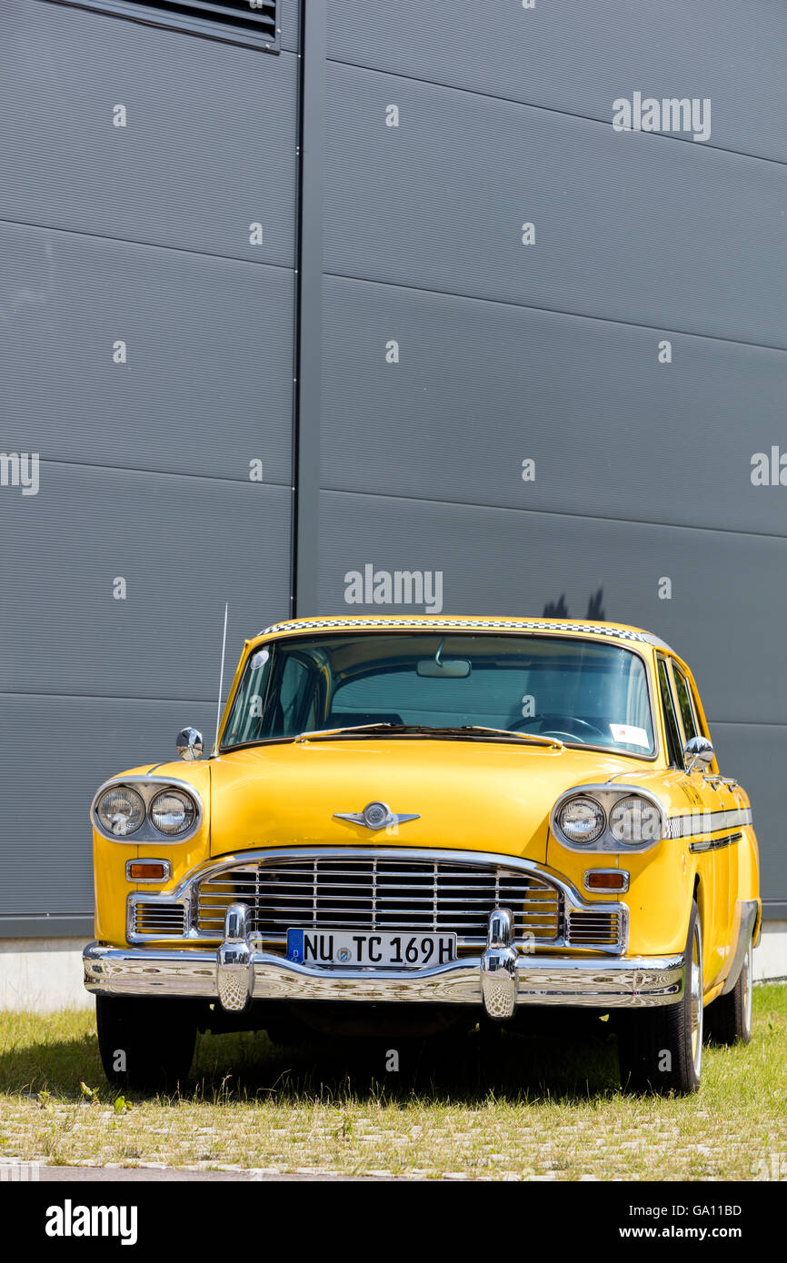 Iconic vintage yellow Checker taxi cab well known among other things from the movie 'Taxi Driver' Stock Photo