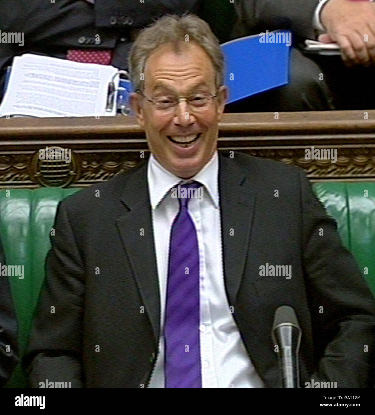 Prime minister tony blair laughs during hi-res stock photography and