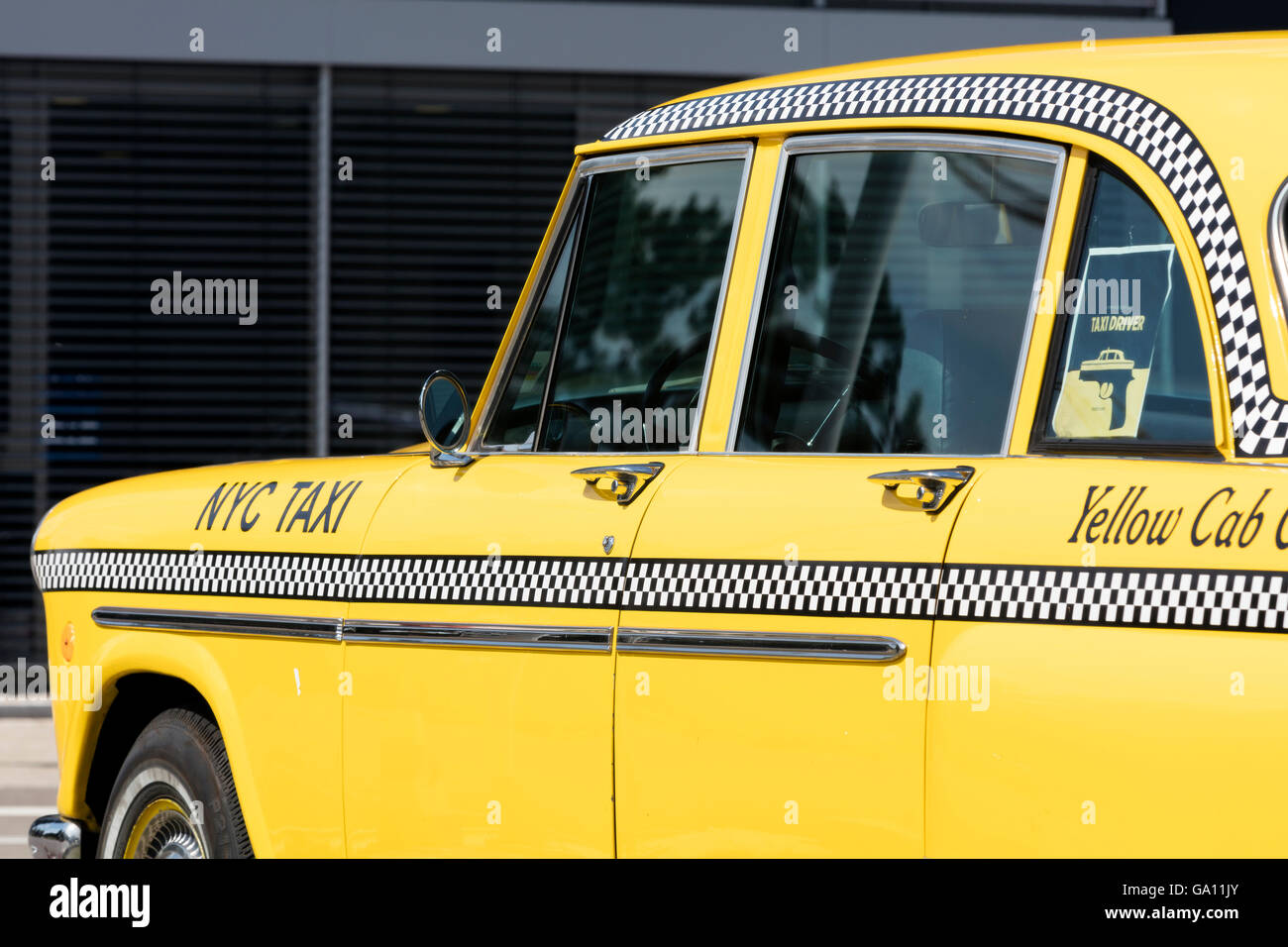 Iconic vintage yellow Checker taxi cab well known among other things from the movie 'Taxi Driver' Stock Photo