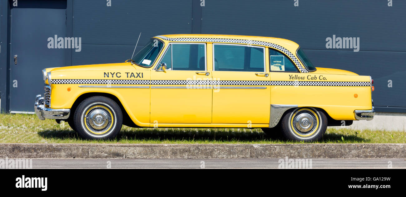 Iconic vintage yellow Checker taxi cab well known among other things from the movie 'Taxi Driver' Stock Photo