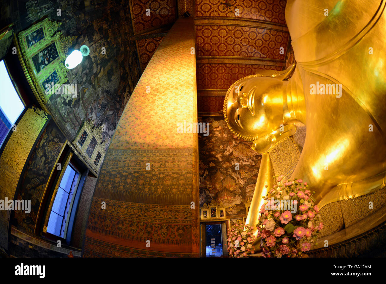 the reclining buddha in the temple of Wat Pho in the city of Bangkok in ...