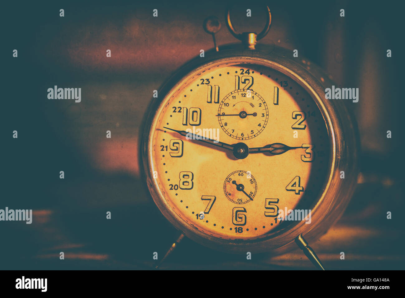 old alarm clock on background Stock Photo - Alamy