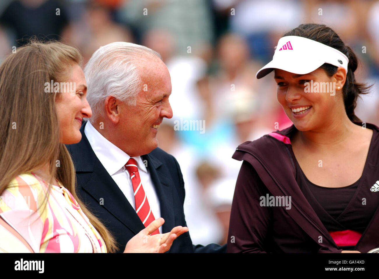 Tennis - 2007 French Open - Day Fourteen - Womens Final - Roland Garros. Mary Pierce (l) and French Tennis Federation President Christian Bimes (c) present runner up Serbia's Ana Ivanovic with her trophy Stock Photo