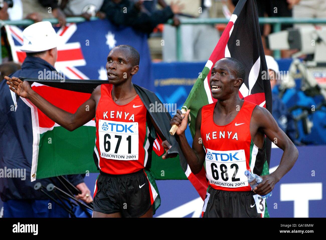 (L-R) Kenya's Bernard Barmasai and Reuben Kosgei perform a lap of honour to celebrate winning bronze and gold, respectively, in the men's 3000m steeplechase Stock Photo