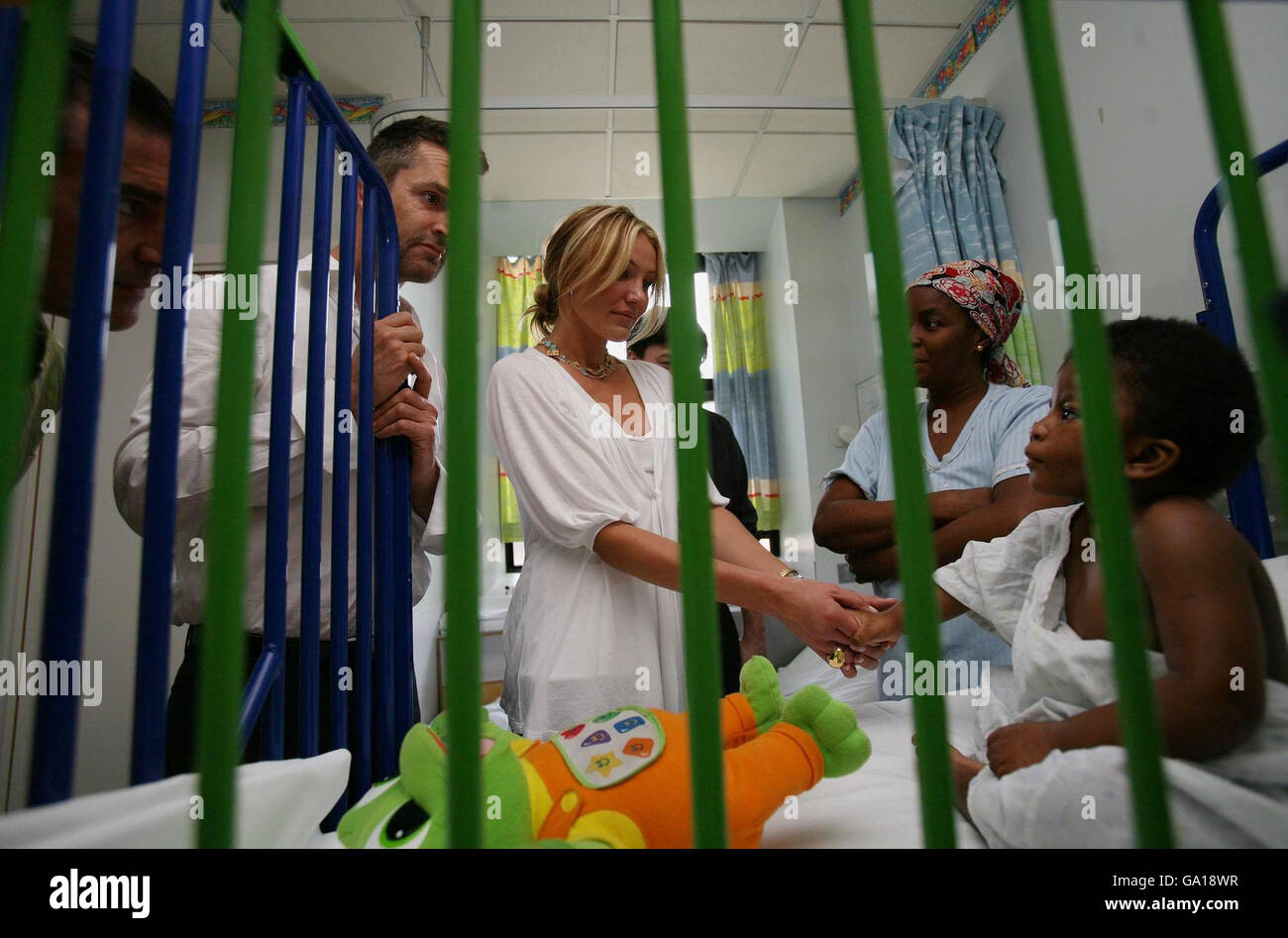 Stars of new film Shrek the Third (left to right); Antonio Banderas, Rupert Everett and Cameron Diaz greet young child Bilai during a surprise visit to Great Ormond Street Hospital in central London. Stock Photo