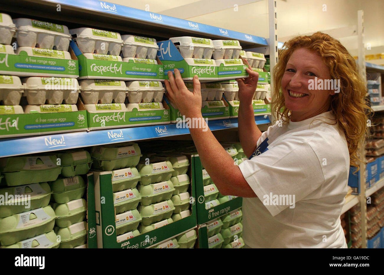 Charlie Dimmock stocks the shelves in Asda with Respectful Eggs, the World's First Low-Carbon supermarket eggs, at a store in London. Stock Photo