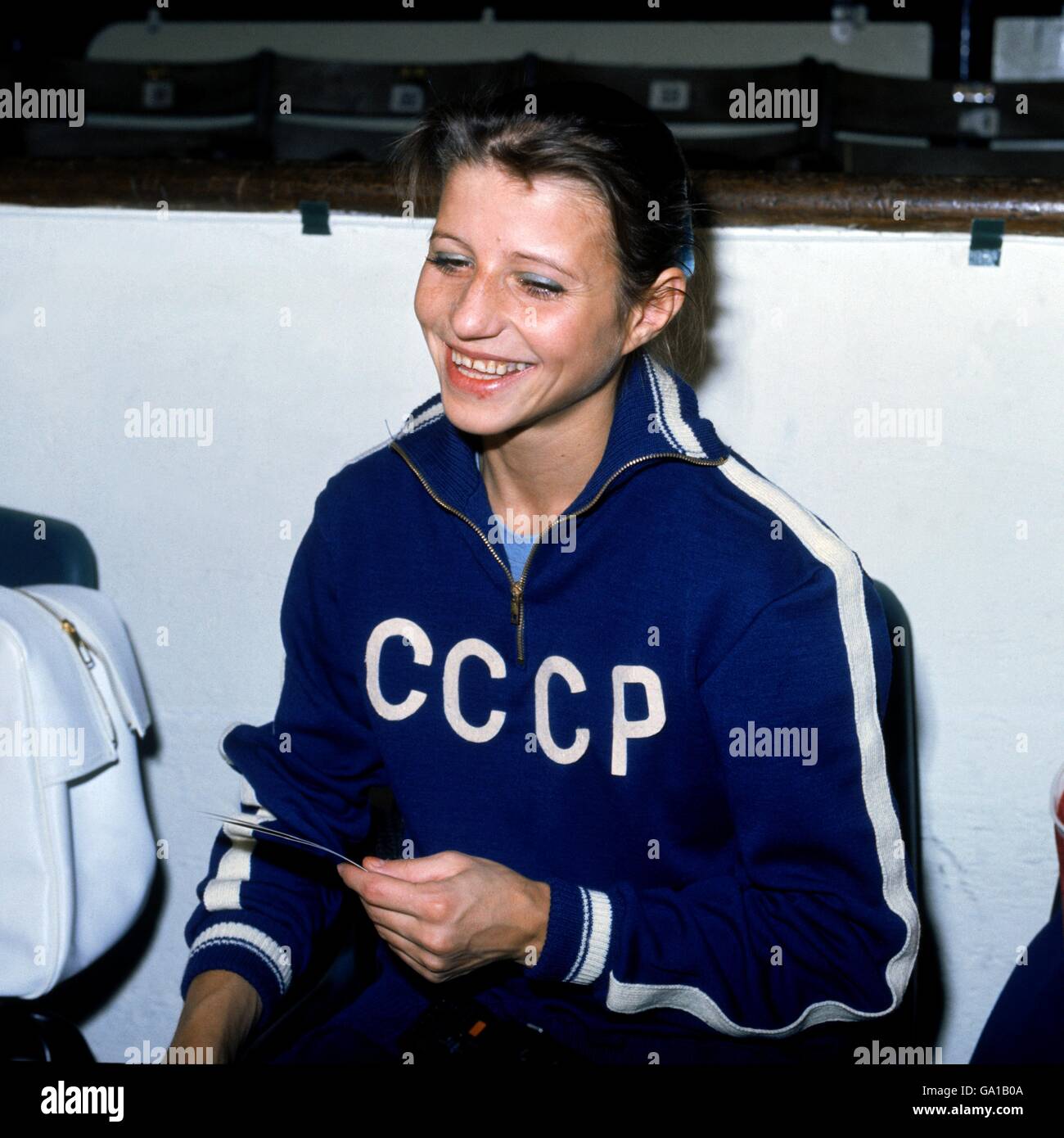Olga Korbut, USSR enjoys a break in performing Stock Photo