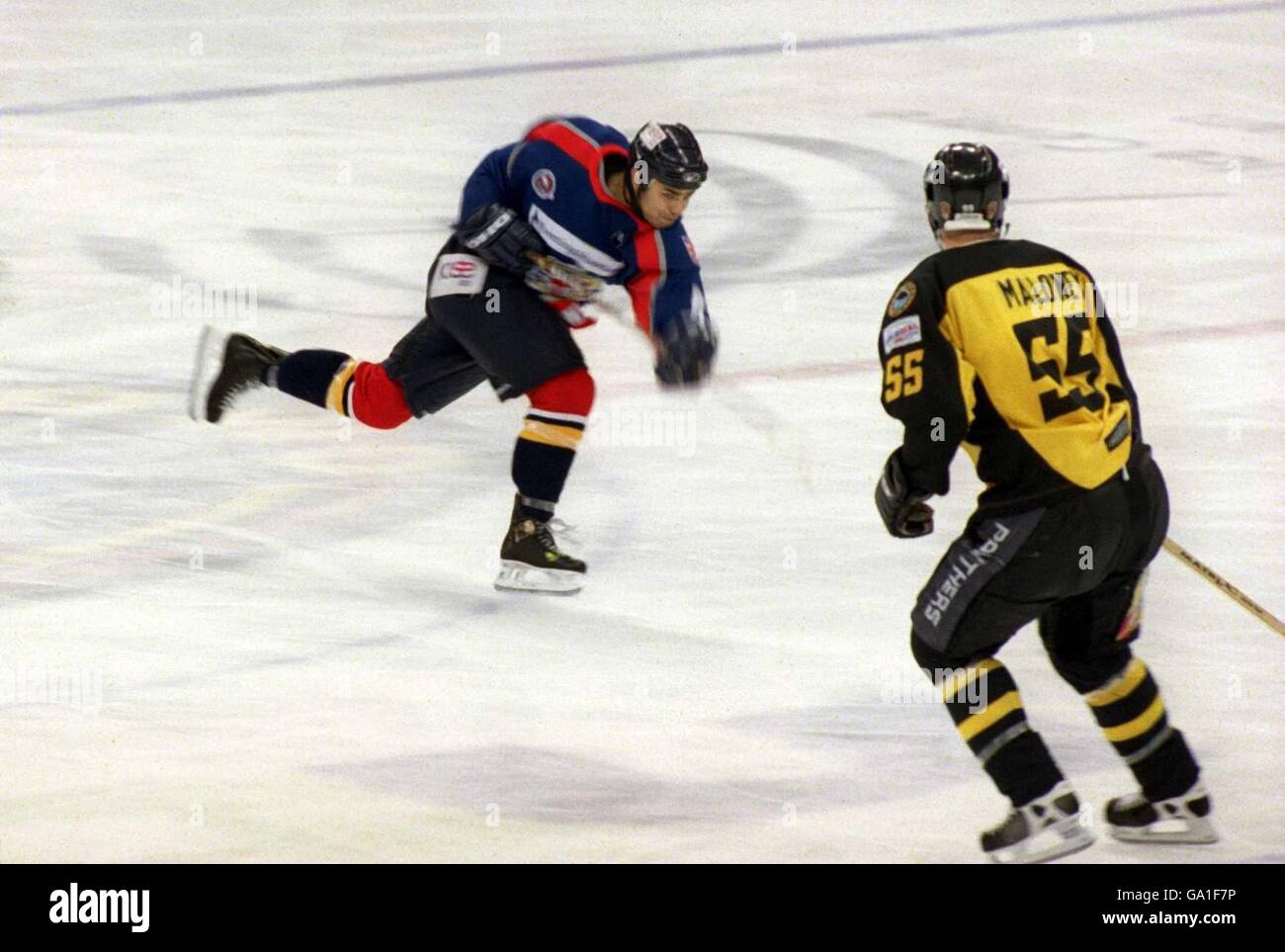 Ice Hockey - Sekonda Superleague - Nottingham Panthers v London Knights.  London Knights' Kim Ahlroos (l) hits a slapshot as Nottingham Panthers'  Darren Maloney (r) looks on Stock Photo - Alamy
