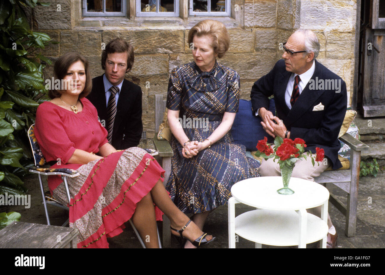 Conservative Party leader Margaret Thatcher relaxing with husband Denis and their 25 year old twins, Mark and Carol at Scotney Castle, Kent. Stock Photo