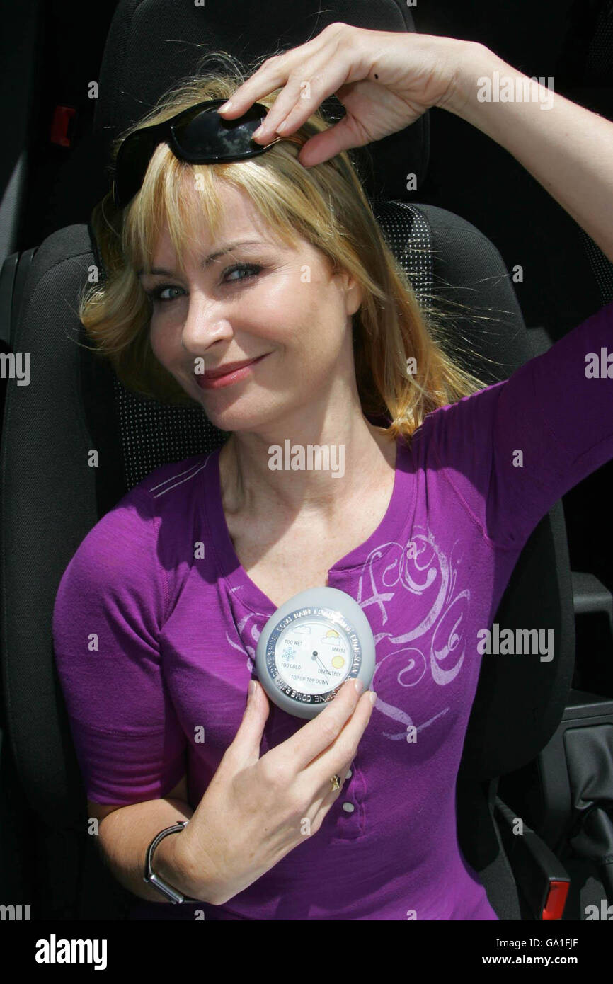 TV weather presenter Sian Lloyd launches the new Vauxhall Astra TwinTop Barometer on the first day of British Summer Time in Brockwell Park, south London. Stock Photo