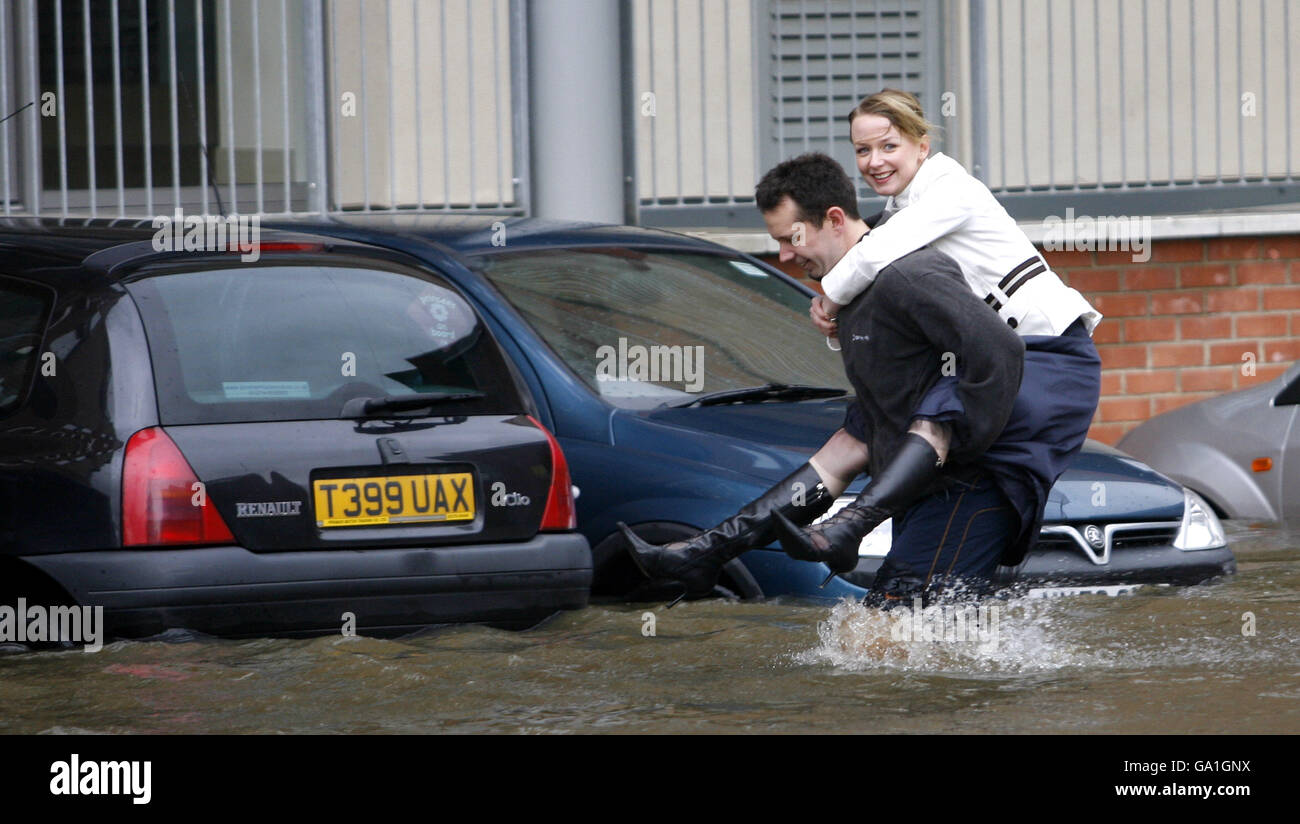 City centre residents make their way home after the banks of the River ...