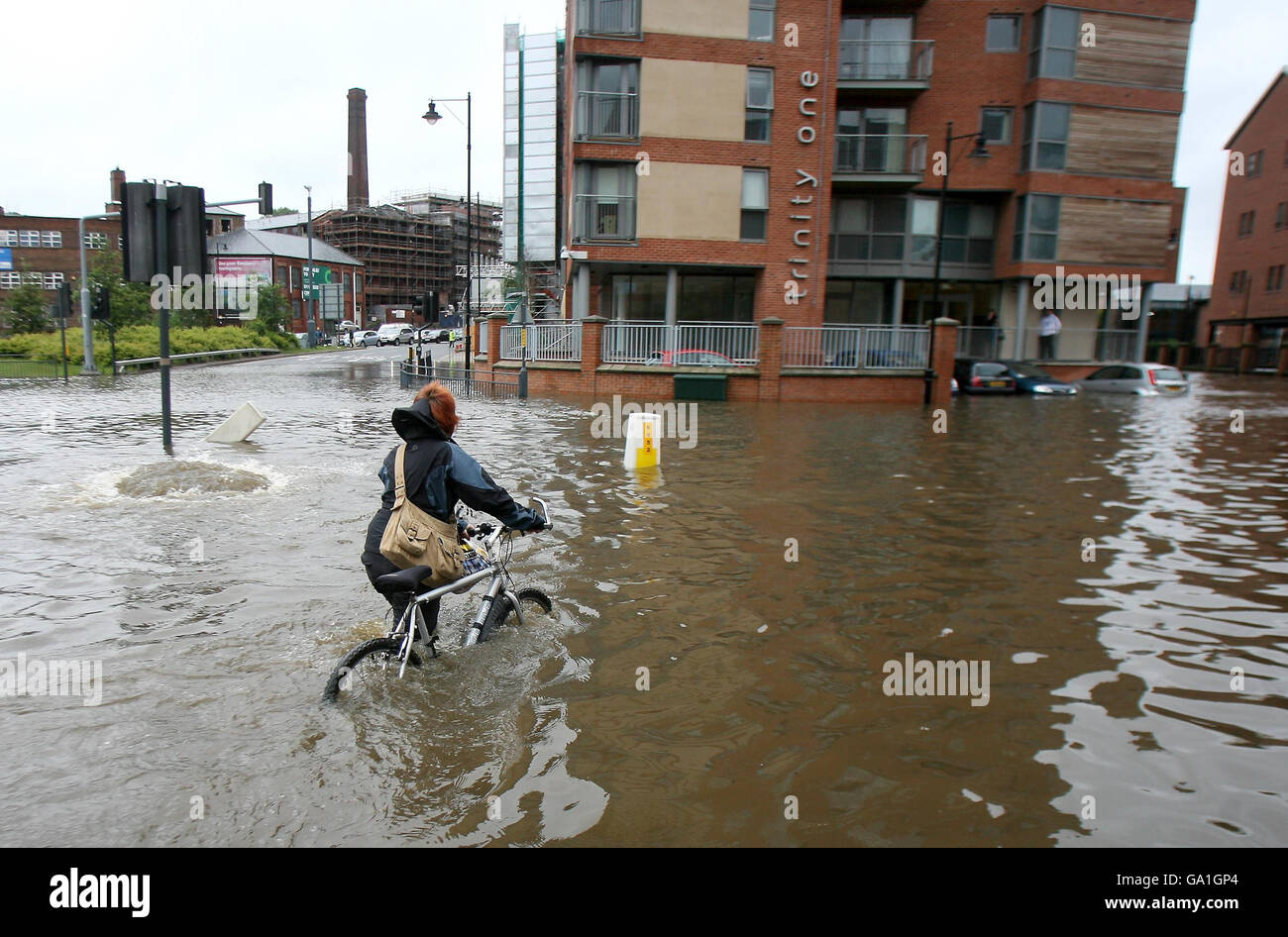 City centre residents make their way home after the banks of the River ...