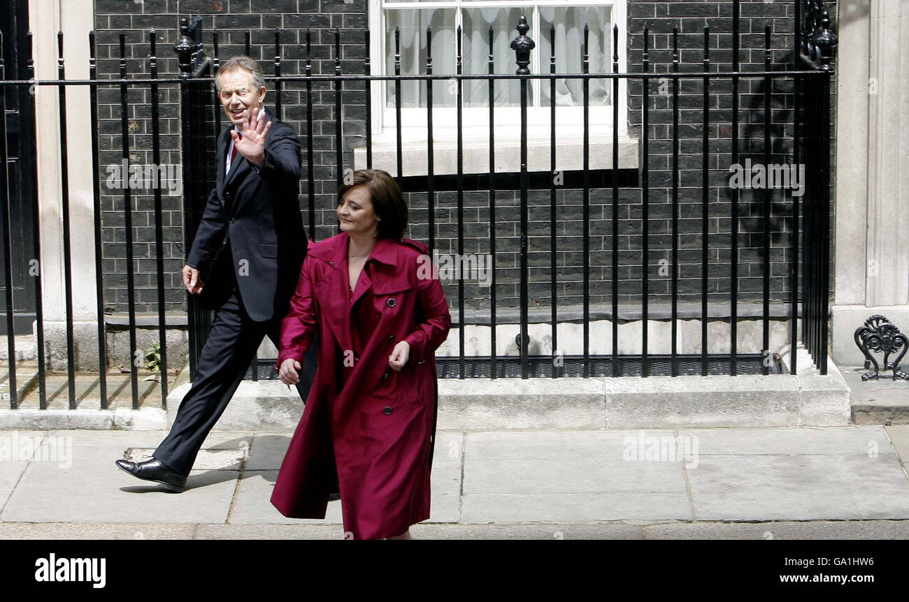 Prime Minister Tony Blair and his wife Cherie leave 10 Downing Street