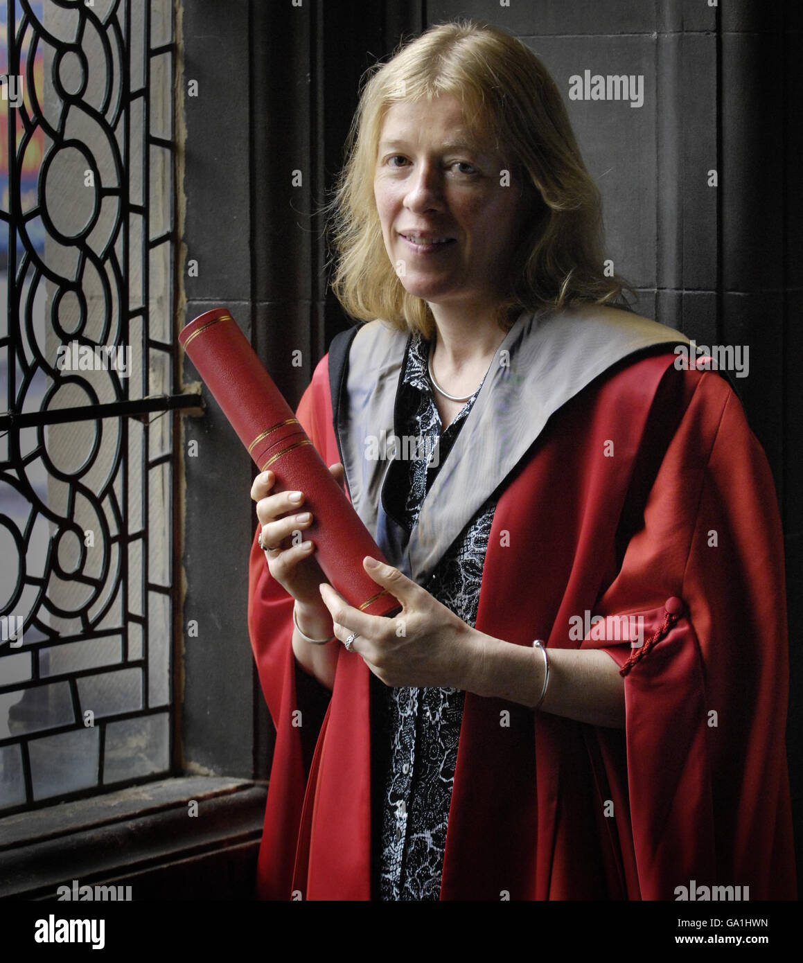 The director of the Edinburgh Book Festival, Catherine Lockerbie, with her honorary degree at Edinburgh University's McEwan Hall. Stock Photo