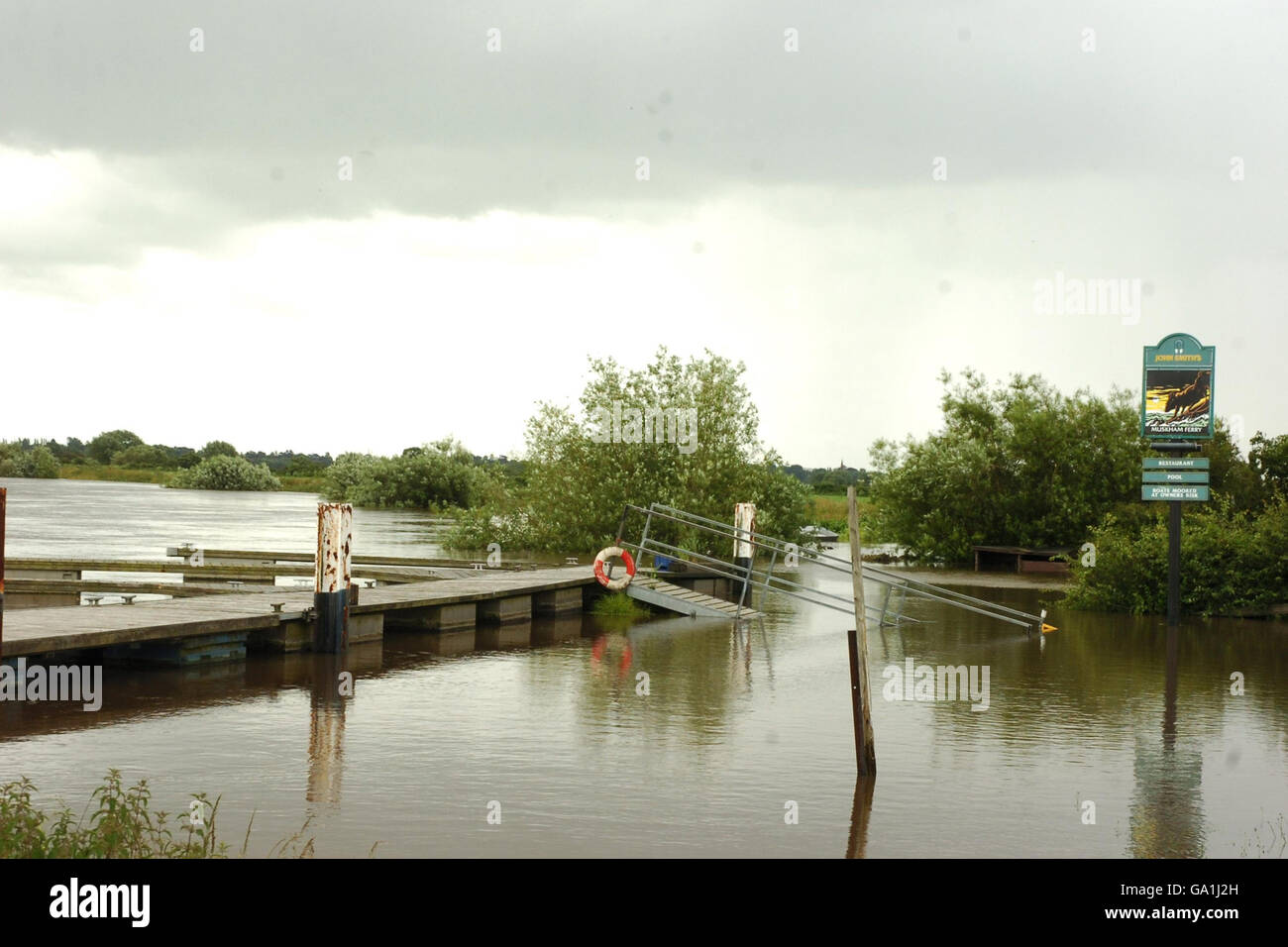 The beer garden of the ferry pub in North Muskham, Nottinghamshire is flooded after the River Trent bursts its banks. Stock Photo