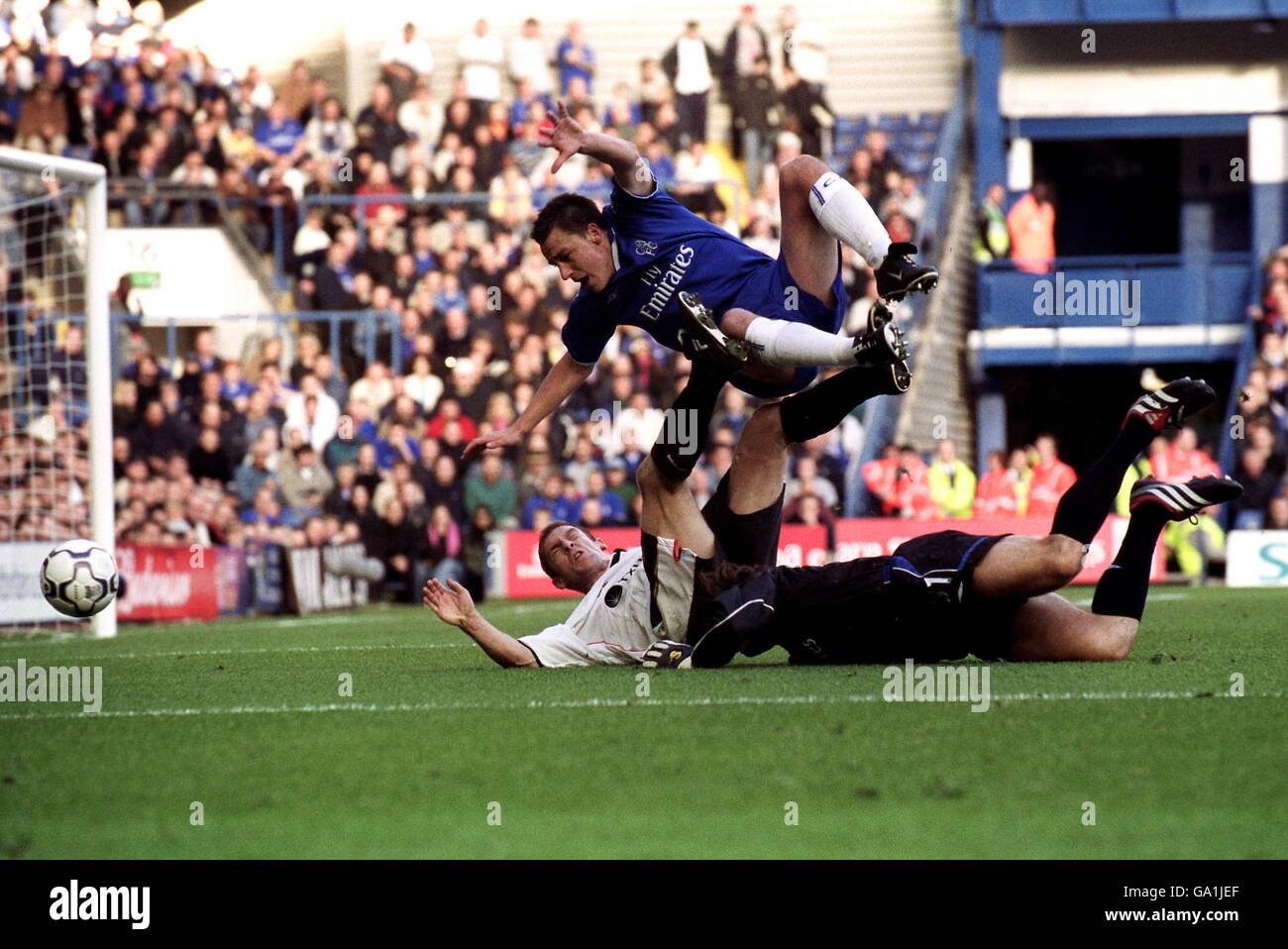 Chelsea's John Terry in full flight as he trips over Ipswich Town's