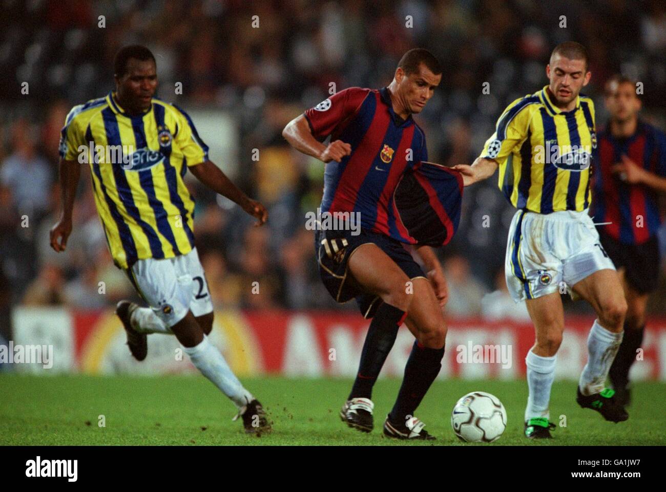 Soccer - UEFA Champions League - Group F - Barcelona v Fenerbahce. Barcelona's Rivaldo (c) tries to get past Fenerbahce's Samuel Johnson (l) and Nikola Lazetic (r) Stock Photo