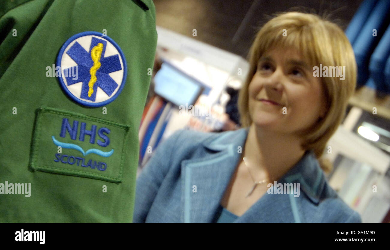 Scottish Health Secretary Nicola Sturgeon Chats To A Paramedic After Giving Her First Address To