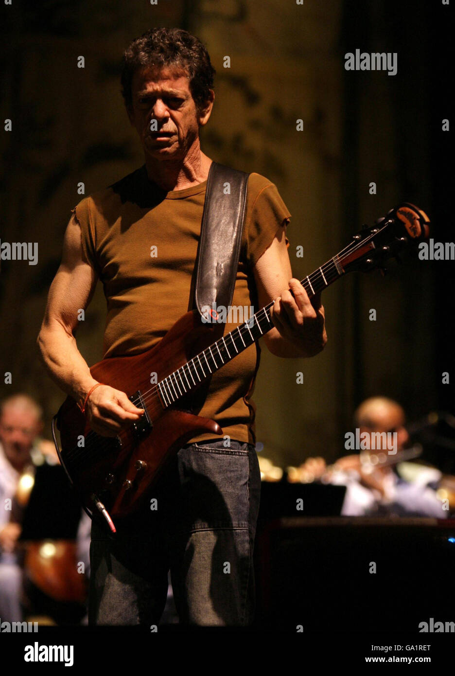 Lou Reed at the Hammersmith Apollo. Lou Reed performing on stage during ...