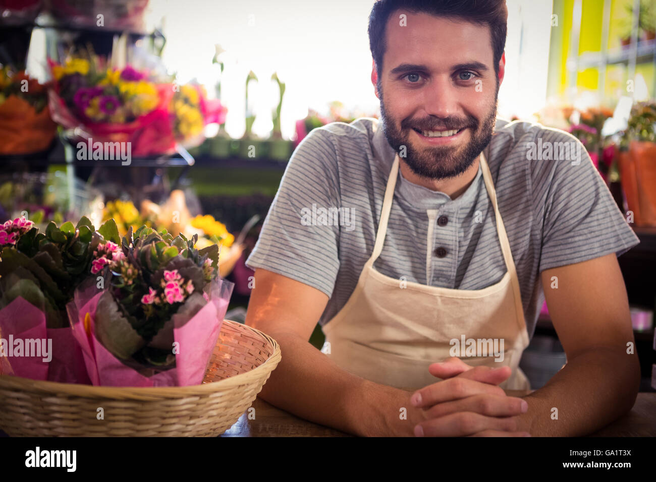 Male florist at his flower shop Stock Photo Alamy