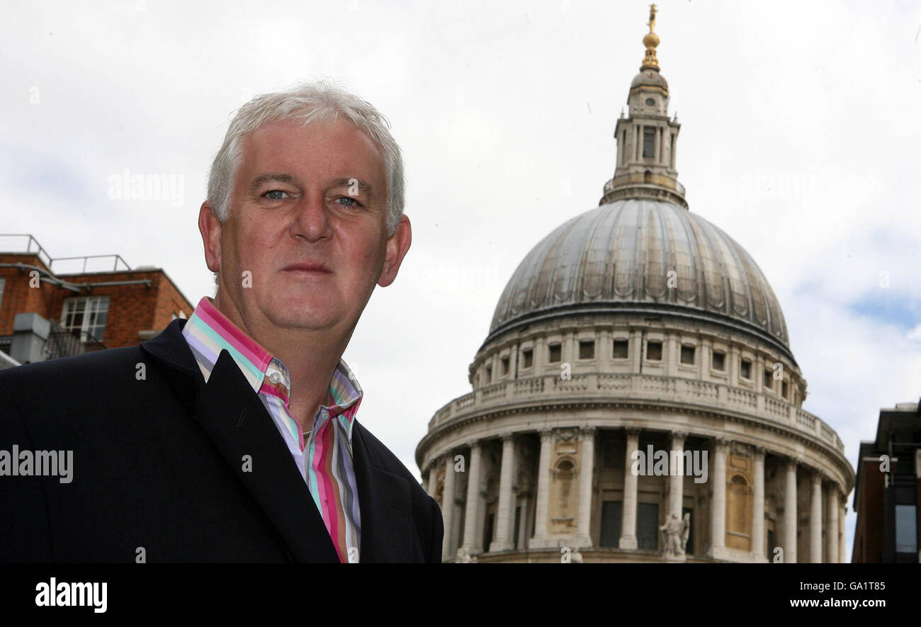 Development Director of St Paul's Foundation Nigel Kirkup stands in front of St Paul's Cathedral in London, following the removal of the scaffolding on the South Transept. Stock Photo