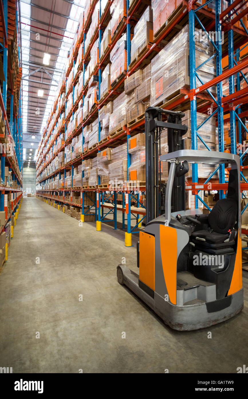 Forklift truck in warehouse Stock Photo - Alamy