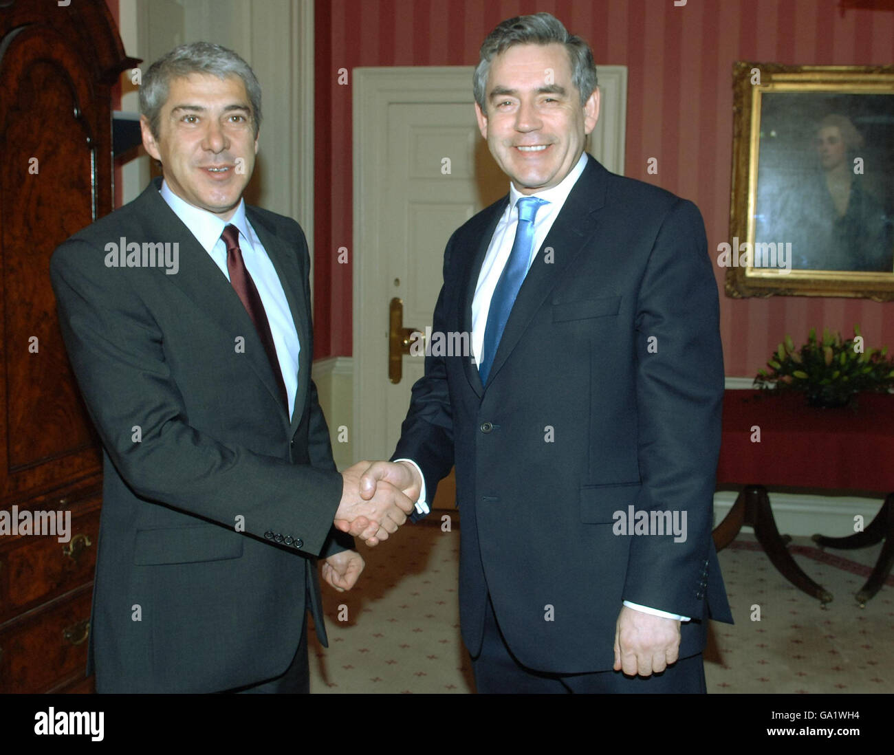 Prime Minister Gordon Brown (right) shakes hands with his Portuguese counterpart Jose Socrates at Downing St. in London today. Stock Photo