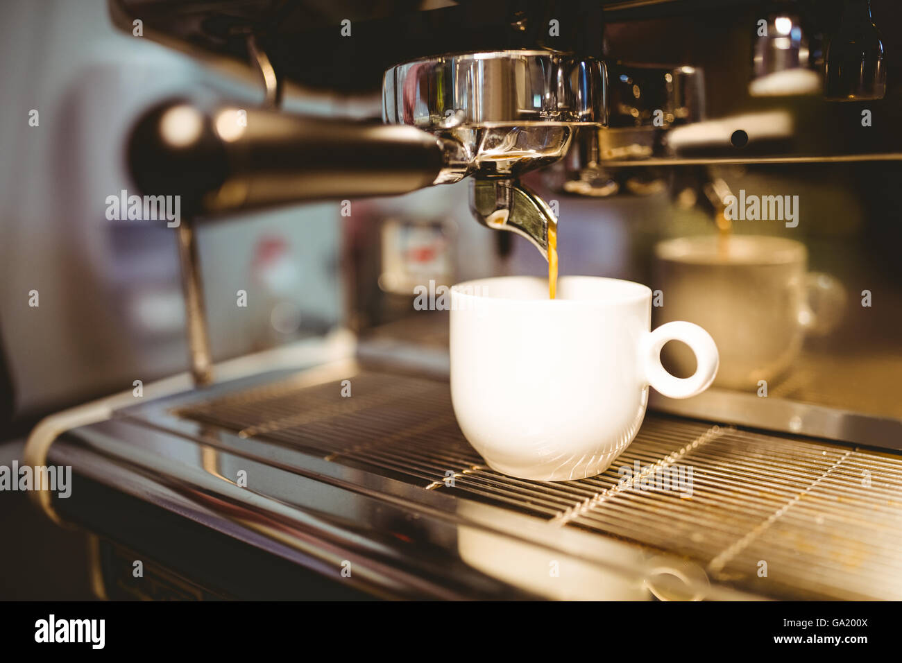 https://c8.alamy.com/comp/GA200X/coffee-machine-making-a-cup-of-coffee-GA200X.jpg