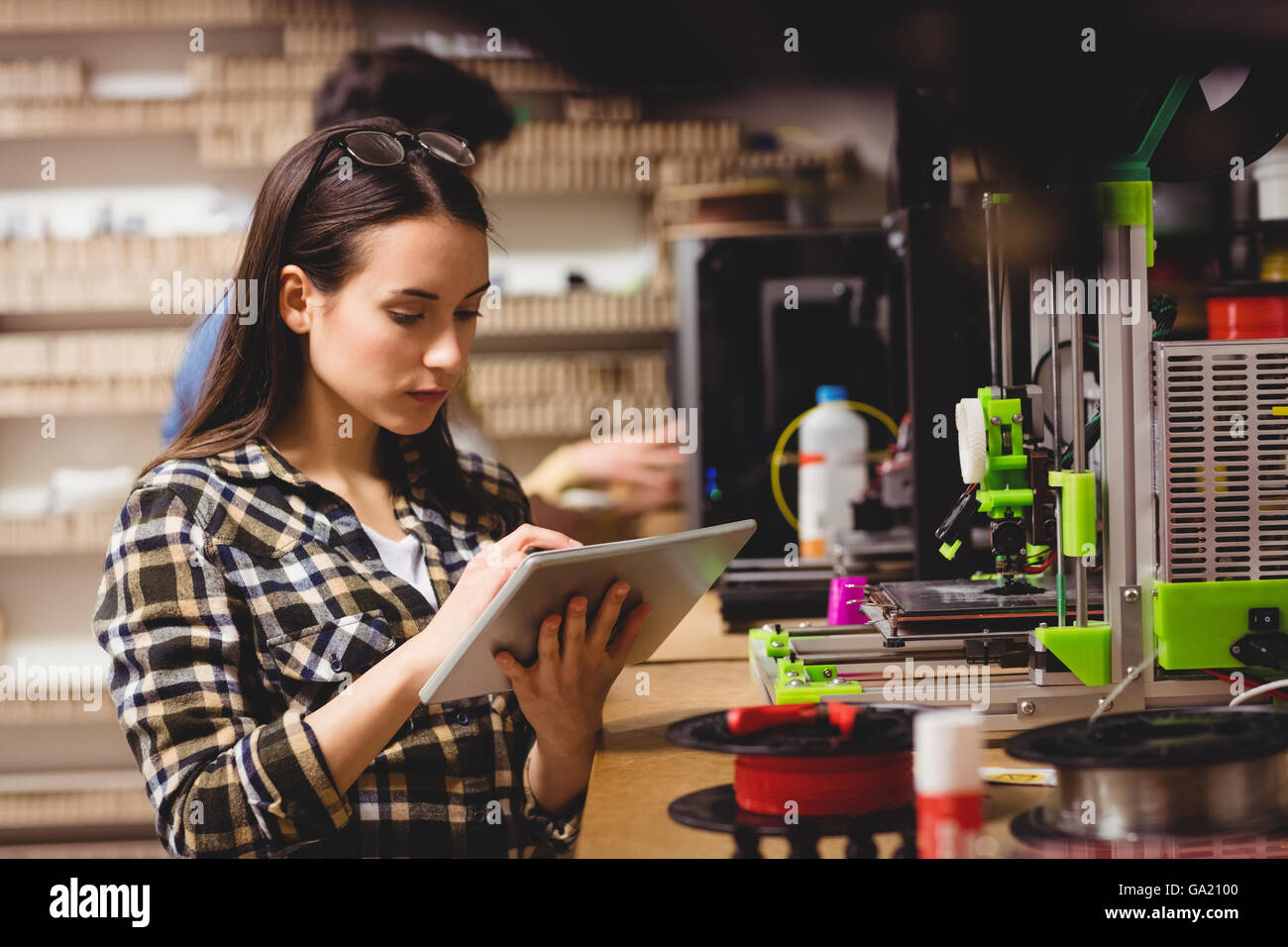 Designer Using Tablet Graphic designer using digital tablet Stock Photo - Alamy