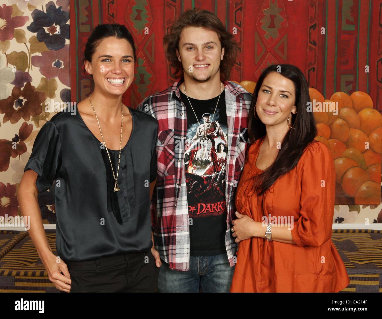 Home and Away cast members Mark Furze (Rik), Jodi Gordon (Martha Stewart), and Kate Ritchie (Sally Fletcher) during a portrait session at the Charlotte Street Hotel, in central London. Issue date: Thursday July 19, 2007. Photo credit should read: Ian West/Features/PA Photos Stock Photo