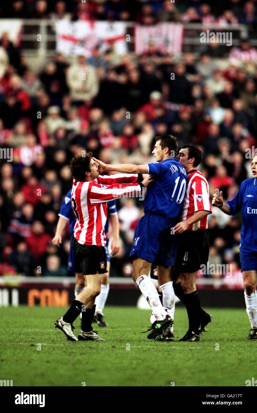 Soccer - FA Barclaycard Premiership - Sunderland v Chelsea. Sunderland's Julio Arca gets a shove in the face from Chelsea's Slavic Jokanovic Stock Photo