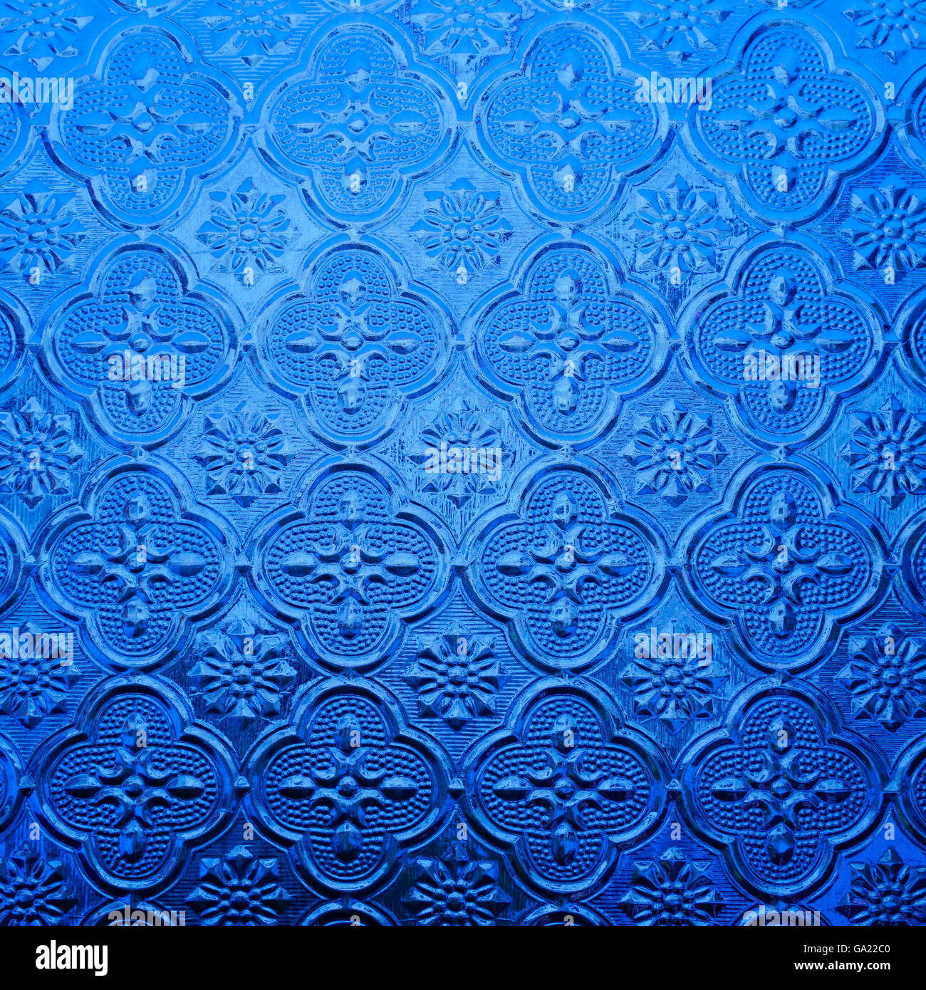 blue color glass with thai pattern style Stock Photo