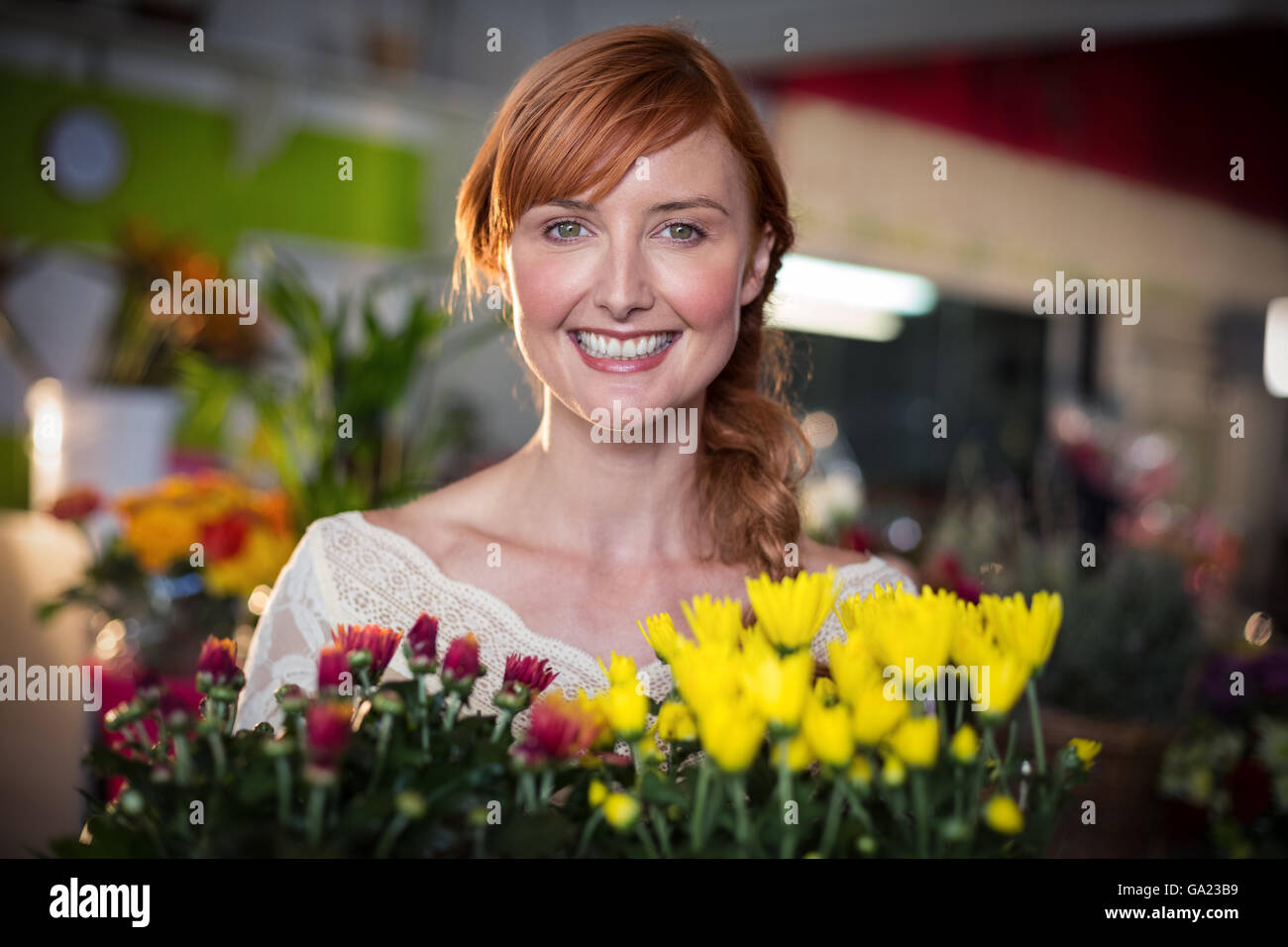Female florist holding flower bouquet Stock Photo Alamy
