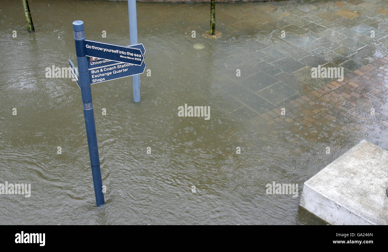 The banks of the River Aire in Leeds city centre are broken as heavy ...
