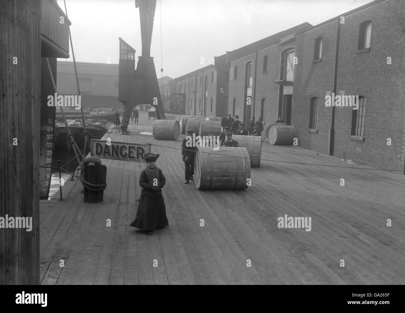 The Docks of London - Royal Victoria Docks - 1913. Unloading tobacco at the Royal Victoria Docks. Stock Photo