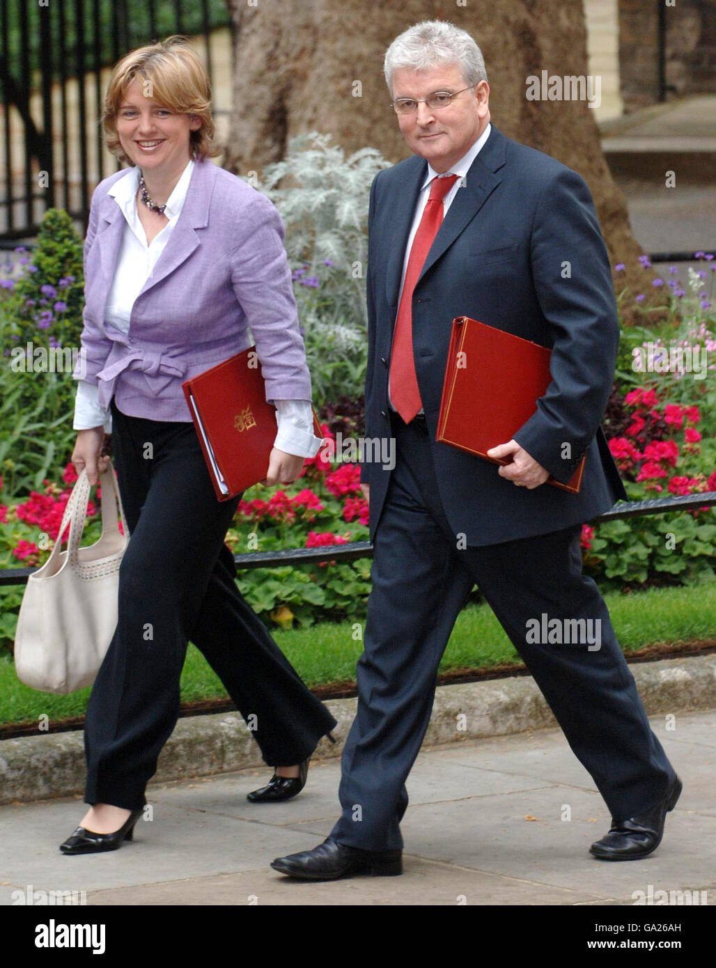 Transport Secretary Ruth Kelly and Defence Secretary Des Browne in Downing Street, London, arriving for their first cabinet meeting with Prime Minister Gordon Brown. Stock Photo