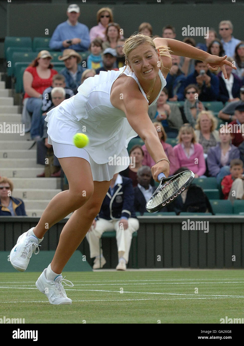 Russia's Maria Sharapova in action against France's Severine Bremond during The All England Lawn Tennis Championship at Wimbledon. Stock Photo