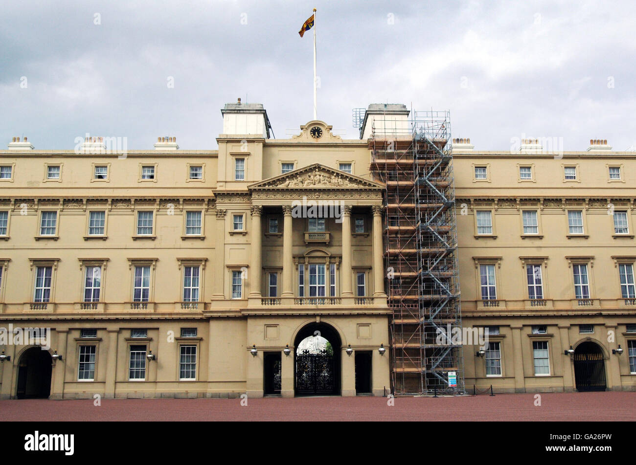 Scaffolding to access badly weathered stone cornicing and roofing in the quadrangle of Buckingham Palace, London. Stock Photo