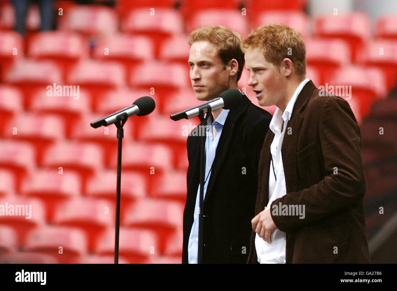 Princes William and Harry address the crowd during the charity concert in memory of their mother Diana, Princess of Wales on what would have been her 46th birthday at Wembley Stadium, London. Stock Photo
