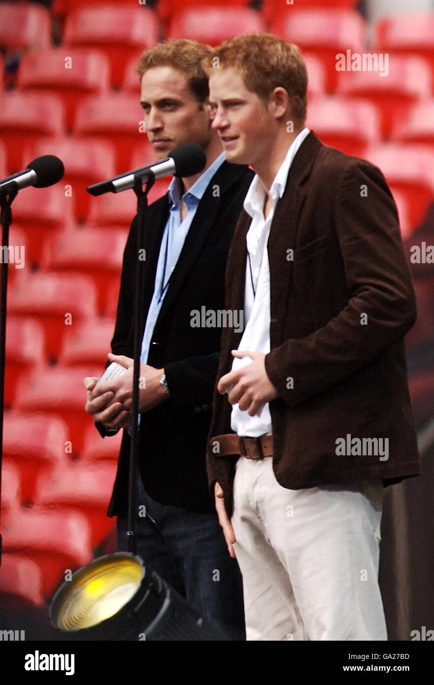 Princes William and Harry address the crowd during the charity concert in memory of their mother Diana, Princess of Wales on what would have been her 46th birthday at Wembley Stadium, London. Stock Photo