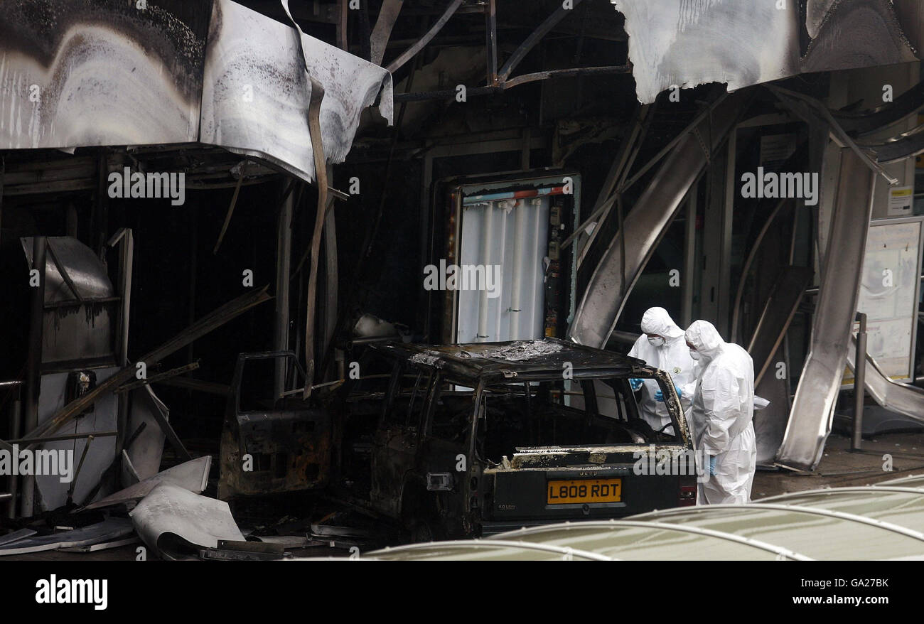 Terminal Forensics Police forensic officers at the scene of yesterday's dramatic attack on ...