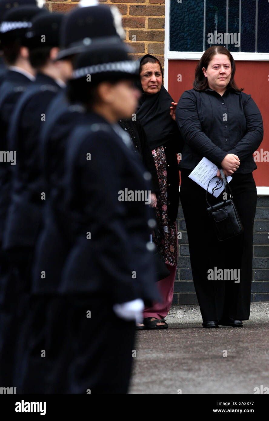 Mary Henry (right), the widow of murdered Policeman Pc Jon Henry, is seen after the funeral of Mary Henry (right), the widow of murdered Policeman Pc Jon Henry, is seen after the funeral of