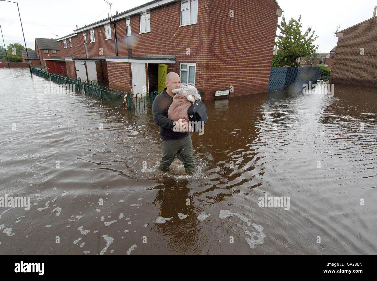 Returning home for a few possessions,Carll Harris of Toll Bar near Doncaster went back to his house in the village for the first time today since the floods. The house was still badly flooded but is lowly receding. Stock Photo