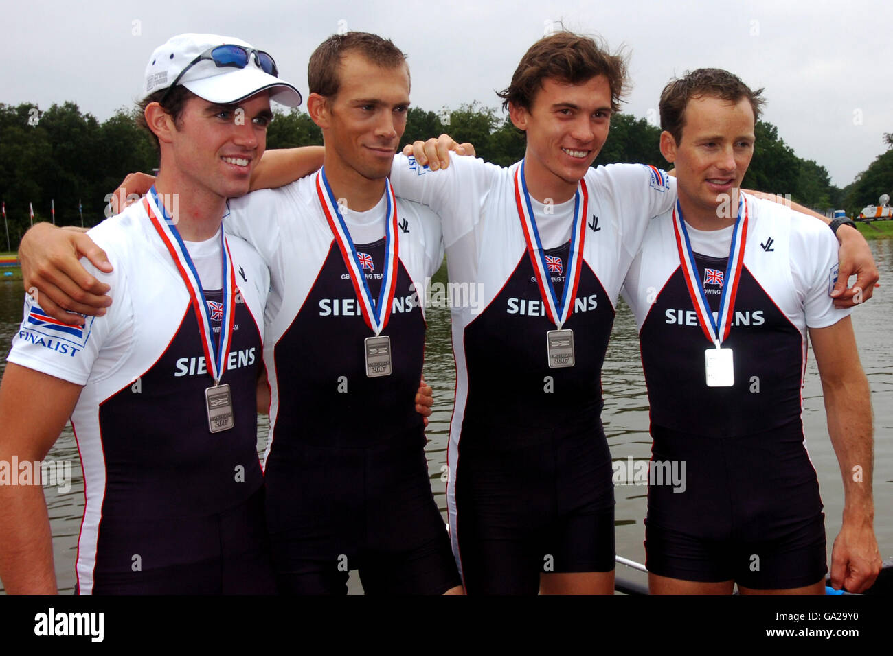 Great Britain's Richard Chambers, James Lindsay-Fynn, Paul Mattick and James Clarke with their silver medals fort the lightweight men's four final A Stock Photo