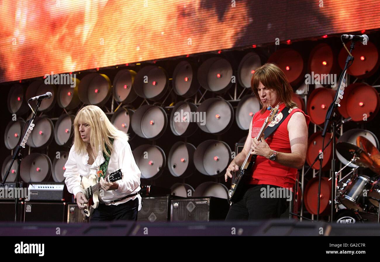Michael McKean (left) and Christopher Guest members of the fictional band Spinal Tap perform during the charity concert at Wembley Stadium, London. Stock Photo